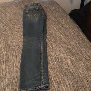 Silver branded blue jeans
